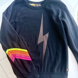 Aviator Nation Black Crewneck with Lightning and Rainbow Stripes